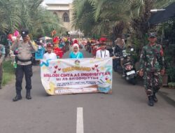 Aksi Humanis Sertu Suparjo: Jaga Kelancaran Pawai Budaya Anak-Anak di Loloan Barat